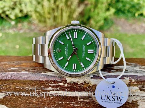 oyster perpetual rolex green dial.